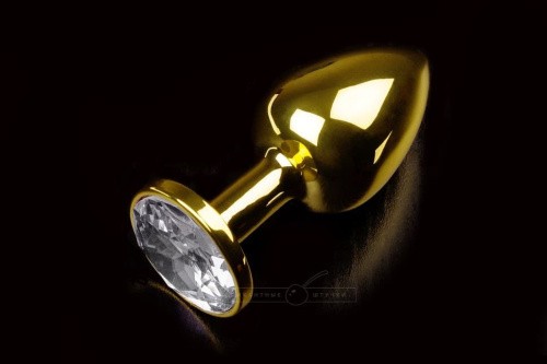 Пікантні Штучки - Мала золотиста анальна пробка з кристалом, 7,5х2,5 см (прозорий)