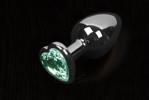 Пикантные Штучки Маленькая серебристая анальная пробка с кристаллом в виде сердечка, 6Х2,5 см (изумрудный) - sex-shop.ua