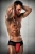 Passion 007 Thong - Чоловічі трусики з червоним гульфіком, L/XL (чорні з червоним) - купити в Україні | Секс шоп SEX-SHOP.ua