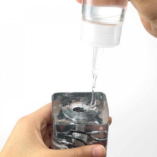 Tenga Crysta Block - мастурбатор с уникальным рельефом, 12х5 см (чёрный)