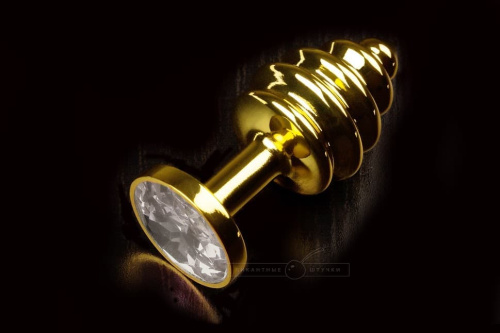 Пікантні Штучки - Кручена золотиста анальна пробка з кристалом мала, 7,5х2,7 см (прозорий)