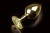 Пікантні Штучки - Велика золотиста анальна пробка з заокругленим кінчиком, 9х4 см (жовтий)