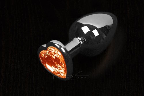 Пікантні Штучки - Велика срібляста анальна пробка з кристалом у вигляді сердечка 8, 5Х4 см (помаранчевий)