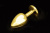 Пікантні Штучки - Велика золотиста анальна пробка з заокругленим кінчиком і кристалом, 9х3, 5 см (зелений)